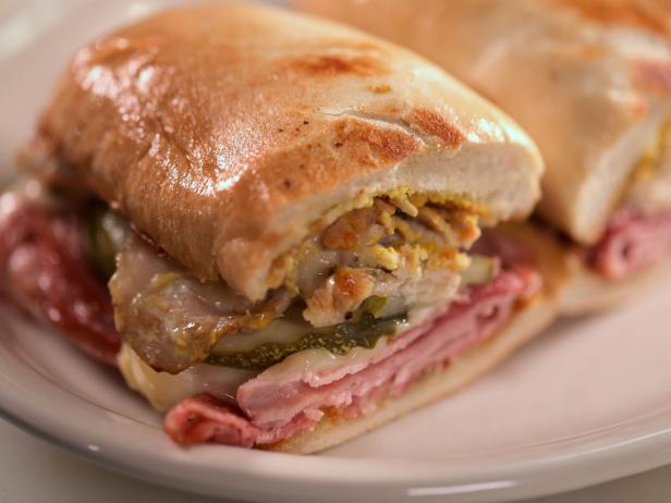 https://food.fnr.sndimg.com/content/dam/images/food/fullset/2021/09/02/DV3411_Cuban-Sandwich_s4x3.jpg.rend.hgtvcom.616.462.suffix/1630595833463.jpeg