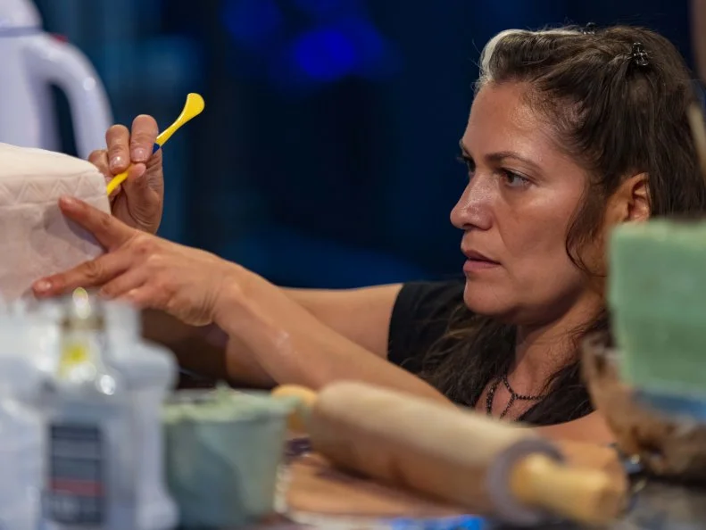 Laura Ramirez works on her teams round 1 dish "KILLER CAKE", as seen on Halloween Wars, Season 11.
