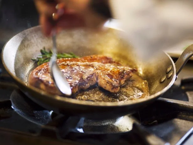 Fried beef steak in a pan