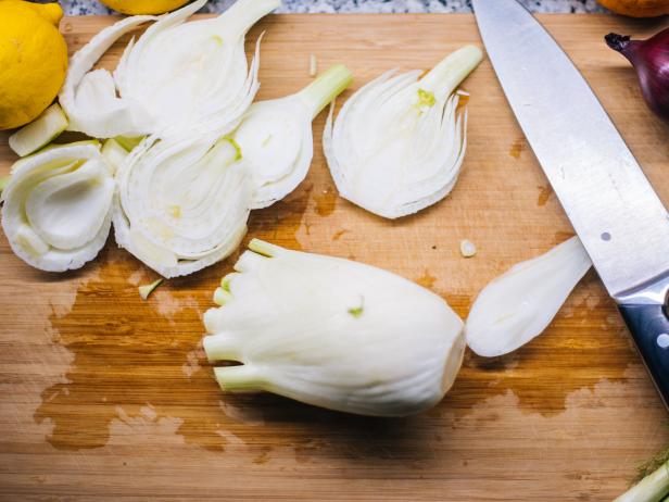Fresh raw organic florence fennel bulbs on kitchen counter