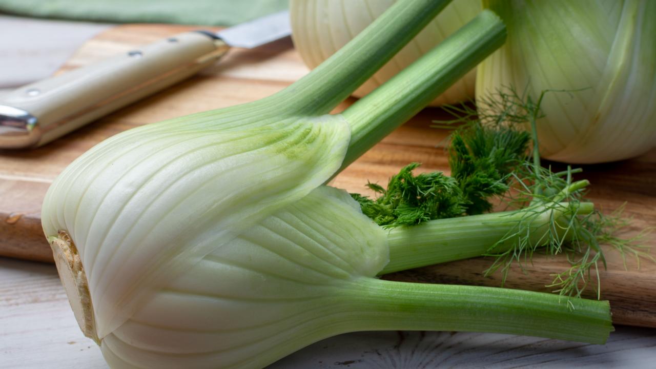 https://food.fnr.sndimg.com/content/dam/images/food/fullset/2021/09/08/fennel-whole-wood-board-knife.jpg.rend.hgtvcom.1280.720.suffix/1631154344227.jpeg