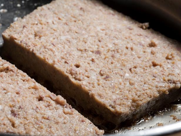 Scrapple, the traditional Pennsylvania breakfast meat product, frying.
