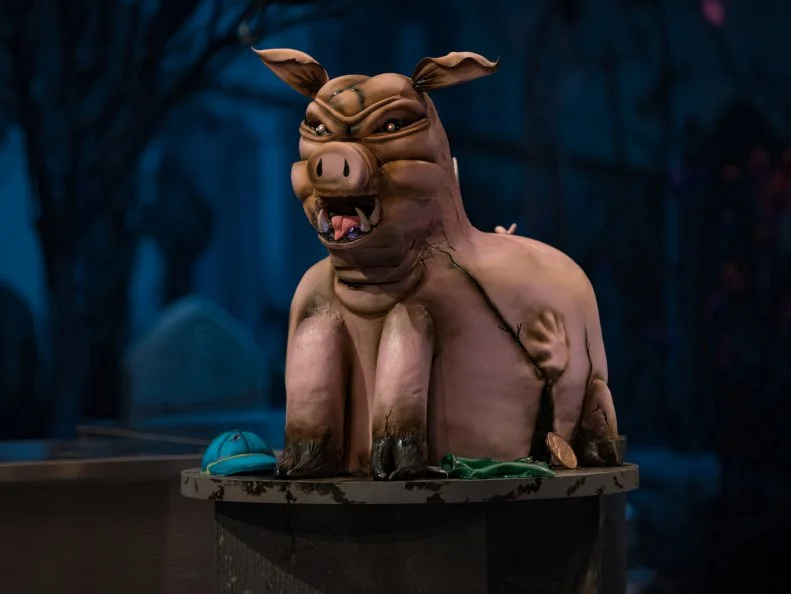 Contestants Corterrius Allen, Holly Webster and Amy Strickland's Round One cake, "POSSESSED PIGGY BANK", as seen on Halloween Wars, Season 11.