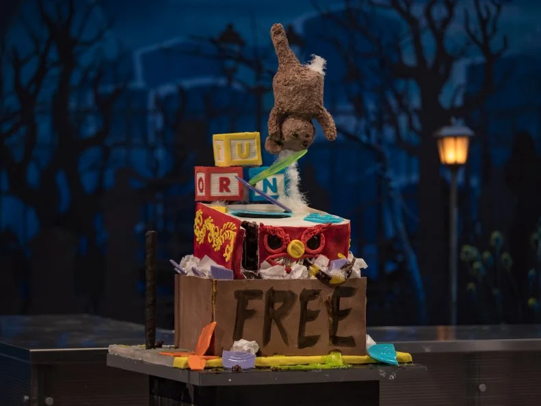 Contestants Natasha "Lucky" Anderson, Sarah Watts and Hunter Roof's round one cake, "POSSESSED TOY BOX", as seen on Halloween Wars, Season 11.