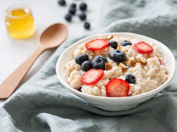 Porridge with berries in a bowl. Healthy food, healthy breakfast, clean eating concept