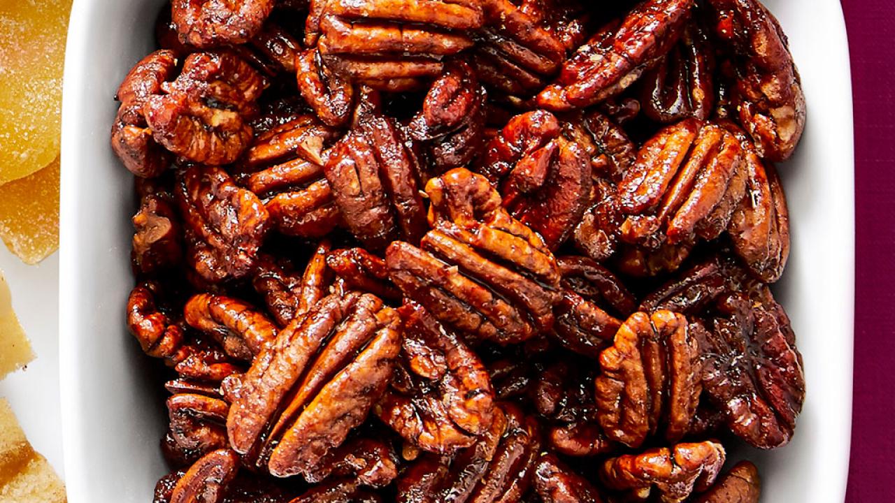 https://food.fnr.sndimg.com/content/dam/images/food/fullset/2021/09/24/0/FNM_110121-Candied-Pecans_s4x3.jpg.rend.hgtvcom.1280.720.suffix/1632510883711.jpeg