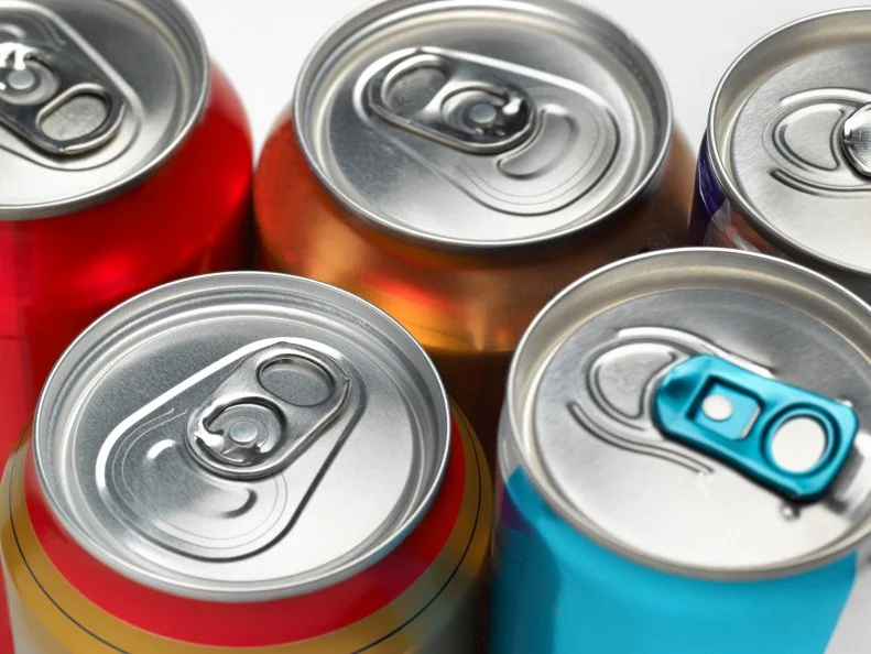 Cola soda fizzy drinks cans