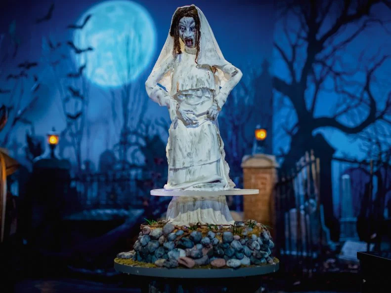 Contestants Lillian Halabi, Jewel Burgess and Kim Simons round 2 cake "CAKE NAME: LA LLORANA", as seen on Halloween Wars, Season 11.