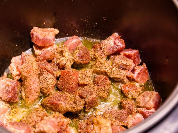 Pork meat preparing in the slow cooker