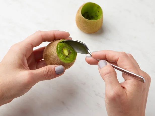 Food Network Kitchen’s How to Peel a Kiwi With a Vegetable Peeler, as seen on Food Network.
