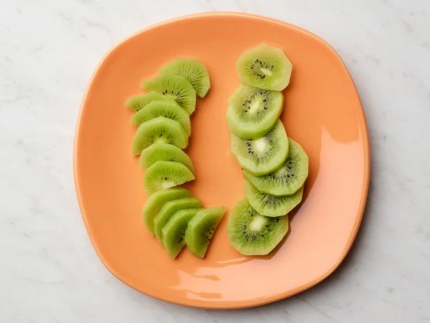 Food Network Kitchen’s How to Peel a Kiwi With a Vegetable Peeler, as seen on Food Network.