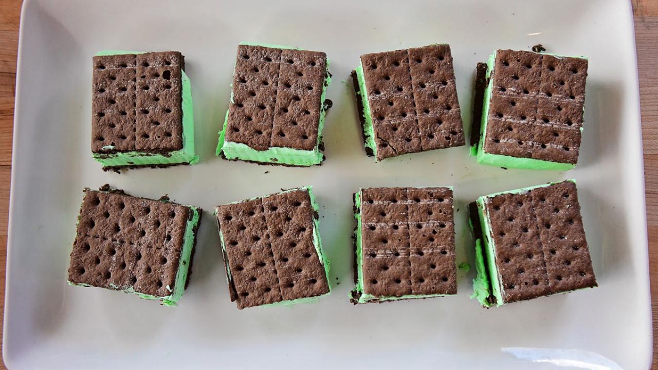 Homemade Ice Cream Sandwiches: I had some Blue Bell in the freezer, so I  just added a scoop between two of my homemade chocolate Graham…