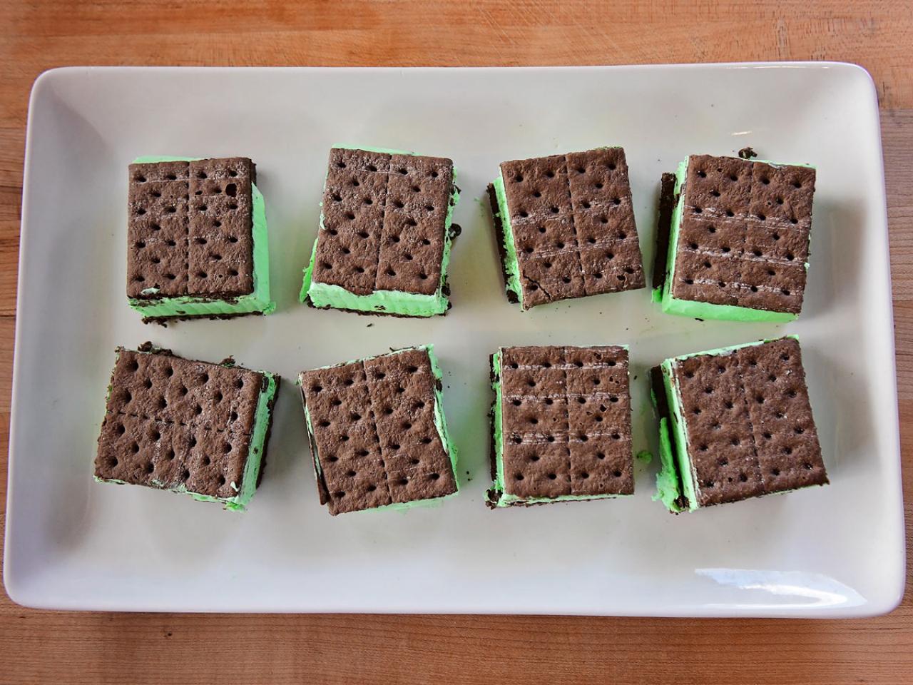 Homemade Ice Cream Sandwiches: I had some Blue Bell in the freezer, so I  just added a scoop between two of my homemade chocolate Graham…