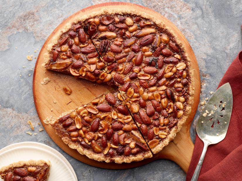 Food Network Kitchen’s Honey Salted Mixed Nut Tart, as seen on Food Network.