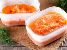 Frozen pumpkin puree. Frozen carrot and pumpkin. Vegetables containing carotene. Concept: Food products for long-term storage.