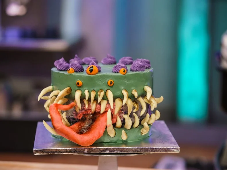 Guillermo Salinas' Limoncello Frightening Fault Line Cake is a Lemon Ginger Cake, Limonchello soak, lemon mousse filling with fresh blueberry, non-bake raspberry compote, swiss buttercream scented with ginger, as seen on Halloween Baking Championship, Season 7.