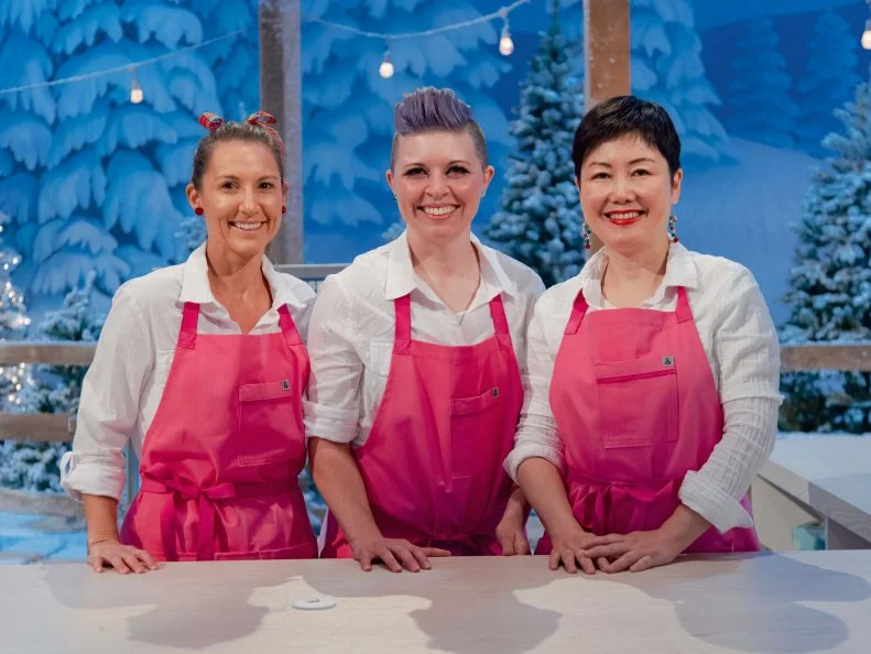 Contestants Marianne Daquino, Megan Clemens and Yi Han as seen on Holiday Wars, Season 3.