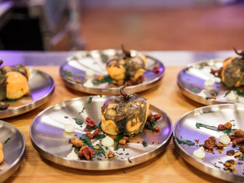 In the elmination challenge Guillermo Salinas made a Pumpkin Cream Puff with Pumpmkin Diplomat Cream with Cream Cheese filling, with a cranberry pumpkin seed crumble, as seen on Halloween Baking Championship, Season 7.