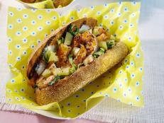 I love a shrimp po'boy. For this version, instead of frying the shrimp, I thought it would be nice to lighten things up and grill them instead. The natural sweetness of the Carolina shrimp really comes through when it's paired with the pickled green tomatoes and tangy aioli.