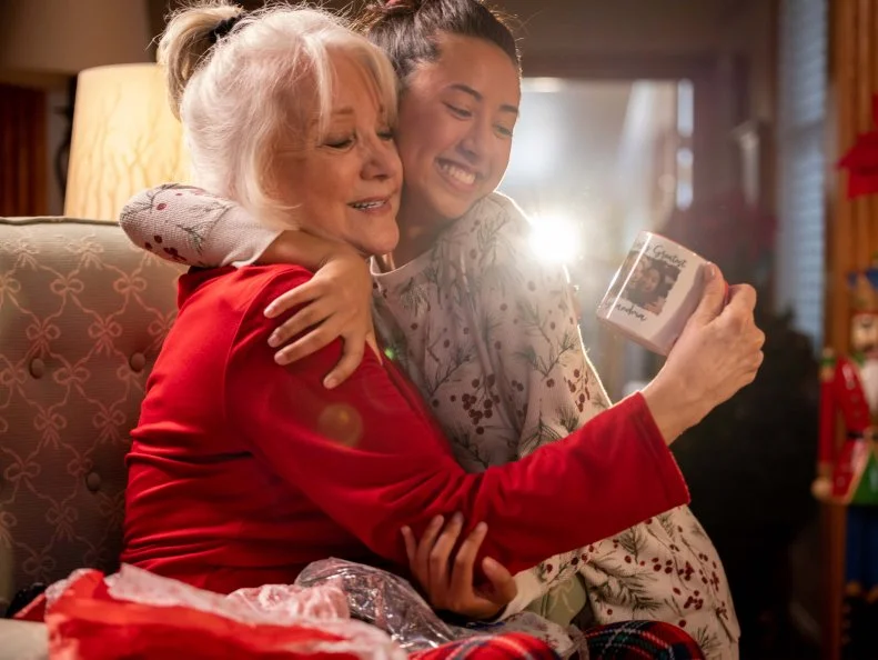 Lee Garlington as Kim Winters and Landry Townsend, as seen in Candy Coated Christmas, Special.