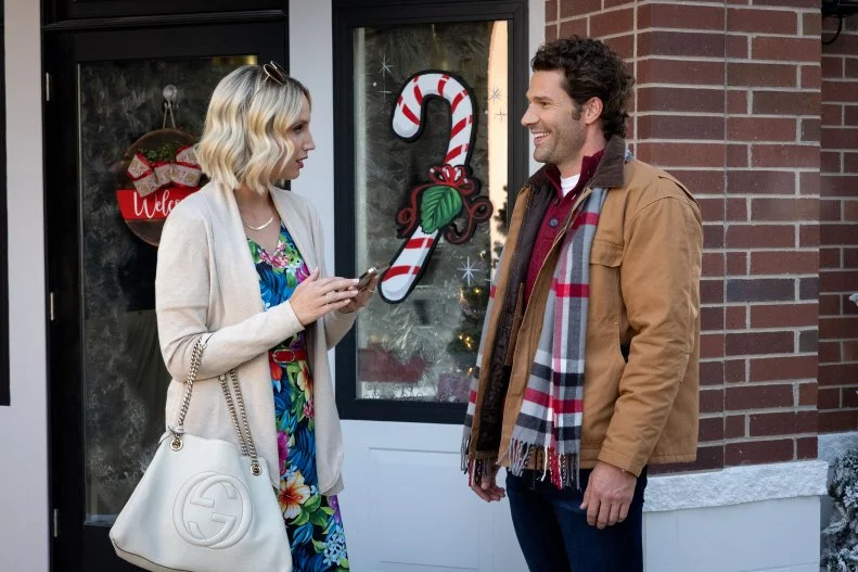Molly McCook as Molly Gallant & Aaron O'Connell as Noah Winter as seen in Candy Coated Christmas, special.