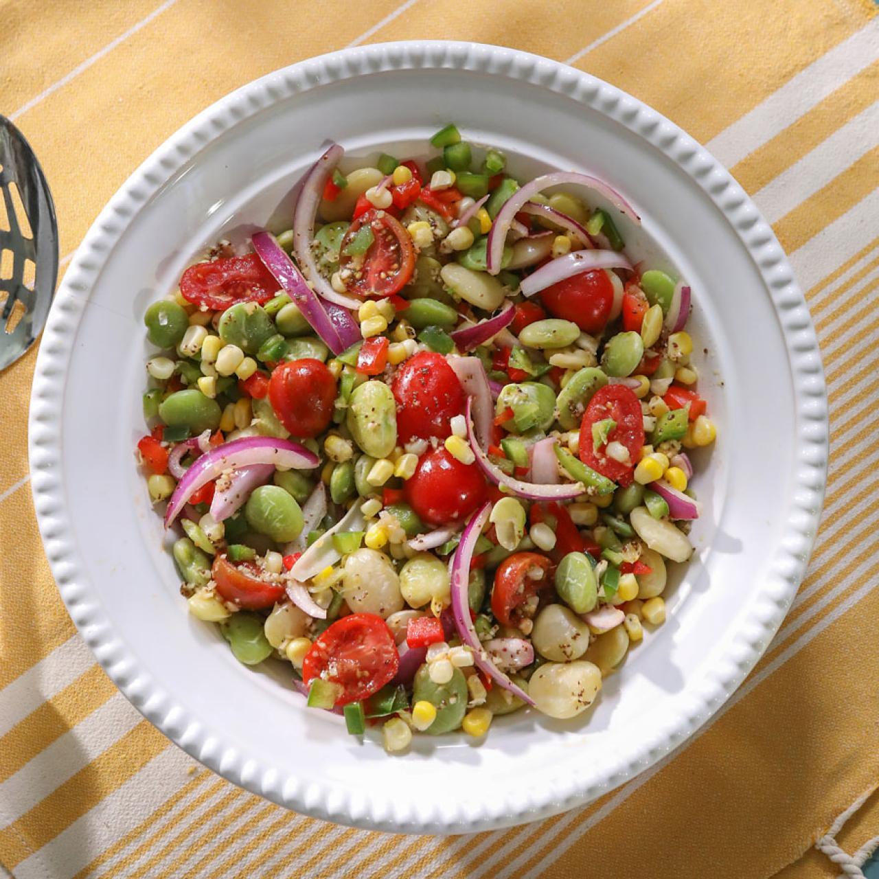 https://food.fnr.sndimg.com/content/dam/images/food/fullset/2021/10/28/QK513_Lima-Bean-Salad_s4x3.jpg.rend.hgtvcom.1280.1280.suffix/1635451166761.jpeg