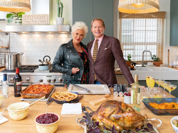 Portrait of hosts Anne Burrell and Carson Kressley at the Thanksgiving dinner, as seen on Battle for the Bird, Special.