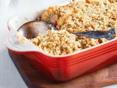 Fresh cheesy tuna casserole with pasta, buttery cracker crumbs and fresh herbs. Could also be used for chicken or ham. Selective focus with blurred background.
