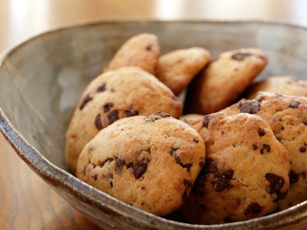 Close-up images of dairy-free chocolate chip banana cookies on the wooden table from high-angle view. This image was taken indoors during the day, February 2018, Hiroshima, Japan.