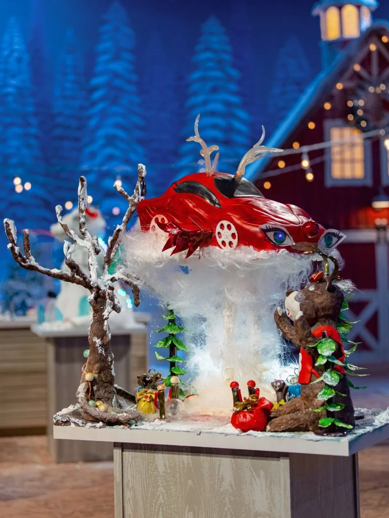 Contestant Debbie Church, Jackie Kock and Orly Yadao's round one cake "The Chocolate Take-Over", as seen on Holiday Wars, Season 3.