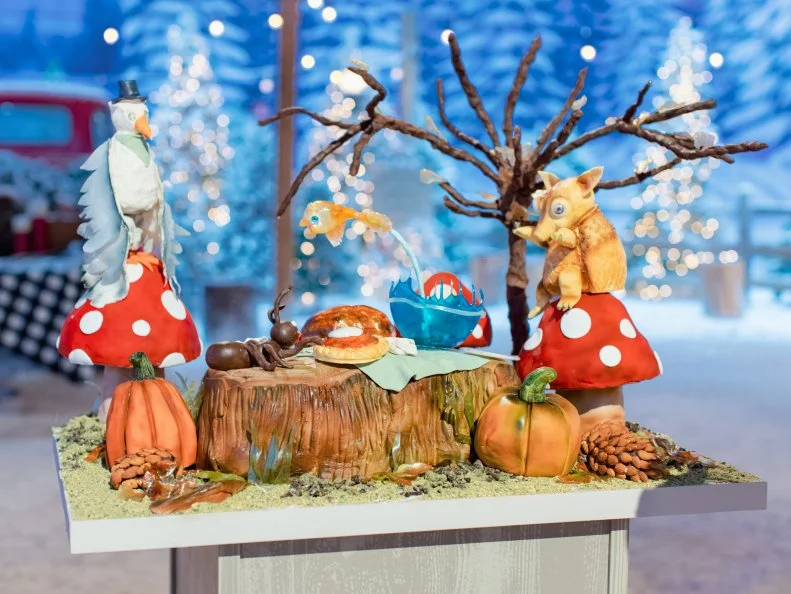 Contestants Angela Cabanyog, Frank LaMendola and Jennifer Moshier's round one cake "Well This Is Hawkward", as seen on Holiday Wars, Season 3.