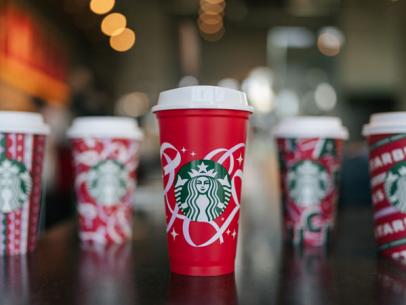 https://food.fnr.sndimg.com/content/dam/images/food/fullset/2021/11/16/Starbucks-Holiday-Cups-with-Reusable-Cup_s4x3.jpg.rend.hgtvcom.406.305.suffix/1637101211928.jpeg