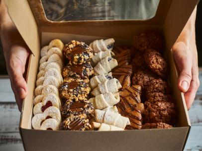 https://food.fnr.sndimg.com/content/dam/images/food/fullset/2021/11/18/Cookies-gift-box-hearts-turtles-rugelach-chocolate-hands.jpg.rend.hgtvcom.406.305.suffix/1637263581869.jpeg