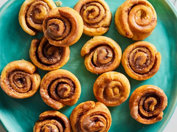 Description: Food Network Kitchen's Air Fryer Mini Cinnamon Rolls. Keywords: Crescent Roll Dough, Cinnamon, Dark Brown Sugar, Confectioners’ Sugar, Milk, Vanilla Extract.