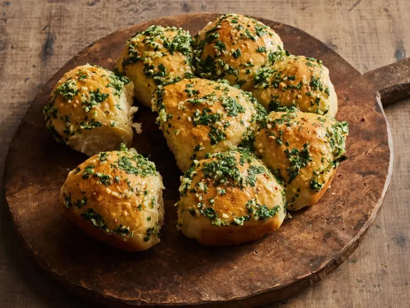Description: Food Network Kitchen's Pampushky. Keywords: Egg, Garlic, Sunflower, Milk, Dry Yeast, Sugar, Parsley, Dill.