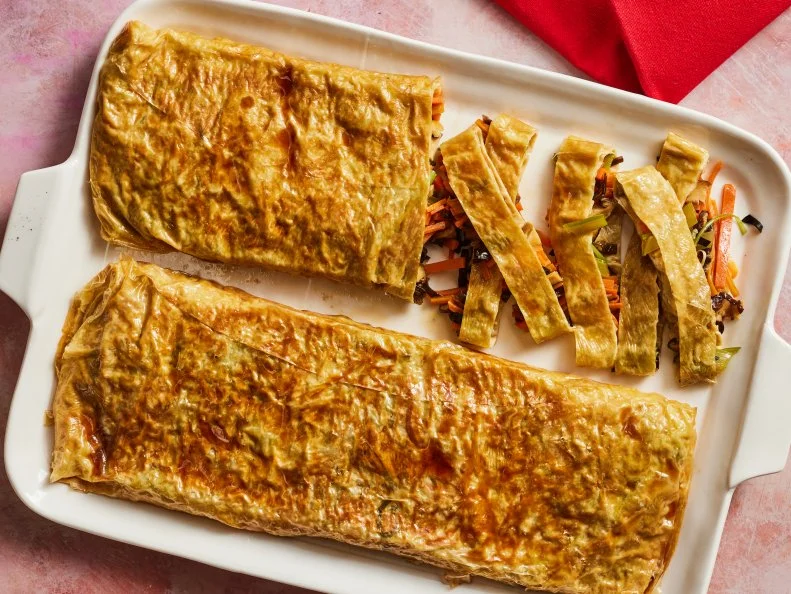 Description: Food Network Kitchen's Vegetarian Mock Duck. Keywords: Shiitake Mushrooms, Wood Ear Mushrooms, Carrots, Celery, Vegetarian Oyster Sauce, Light Soy Sauce, White Pepper, Bean Curd Skins.