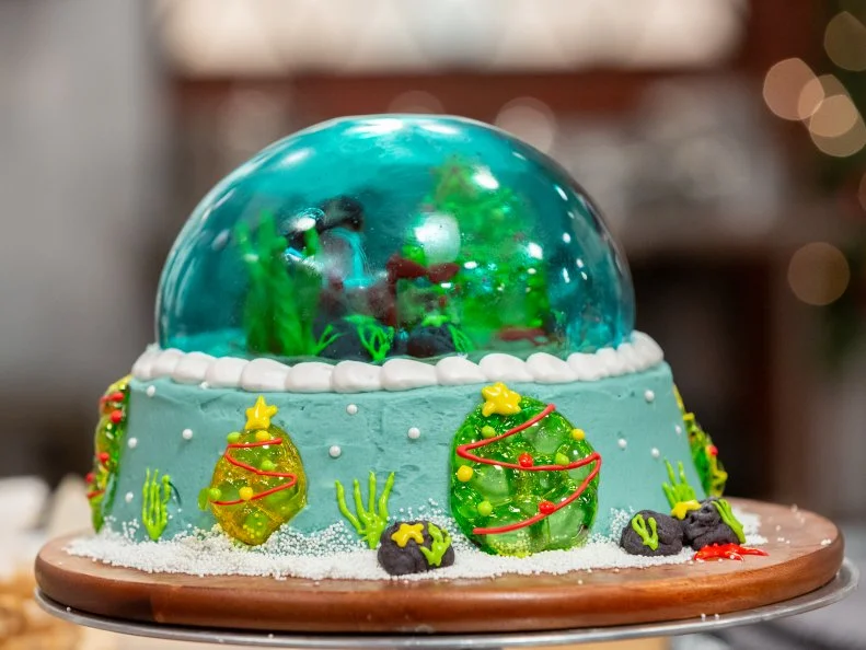 Baker Karen Nguyen's R2 dish: DESIGN: Christmas Under The Sea COOKIE:Vanilla Blood Orange Cardamom Cookie w/ Vanilla Royal and Vanilla Buttercream Icing,  as seen on Christmas Cookie Challenge, Season 5