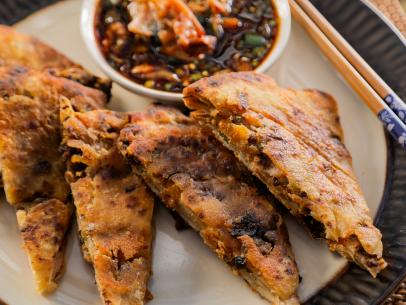 Ming Tsai’s Kimchee Beef Scallion Pancakes with Watercress Slaw, as seen on Guy’s Ranch Kitchen Season 5.