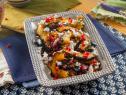 Jet Tila’s Roasted Acorn Squash with Pomegranate and Goat Cheese, as seen on Guy's Ranch Kitchen Season 5.