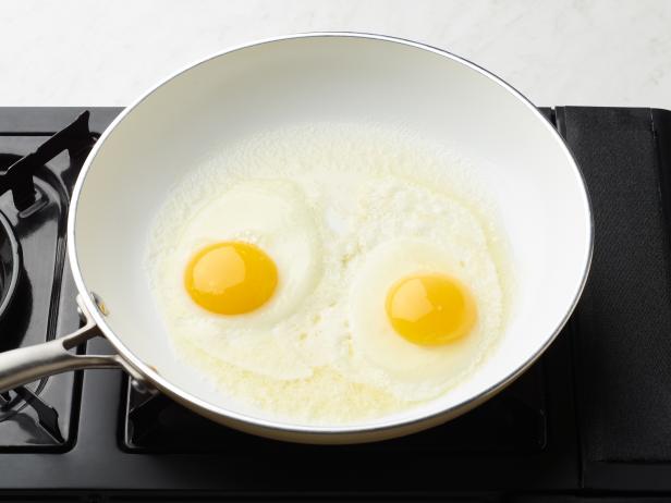Food Network Kitchen’s How to Fry Eggs A Step By Step Guide Sunny-Side Up Cover When the Edges Turn White, as seen on Food Network.
