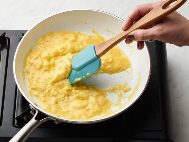 Food Network Kitchen’s How to Scramble Eggs A Step By Step Guide Almost Done, as seen on Food Network.