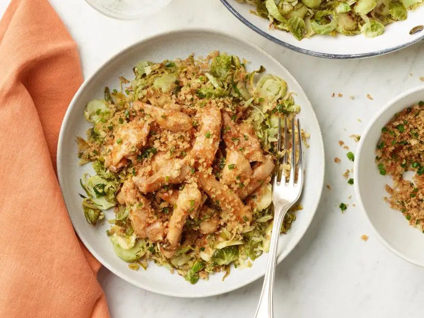 Food Network Kitchen’s Skillet Hot Honey Chicken with Brussels Sprouts, as seen on Food Network.
