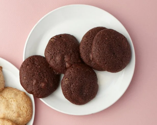 4 in 1 Vegan Chocolate and Vanilla Cookies with 4 mix ins, as prepared for Food Network's Cookie app.
