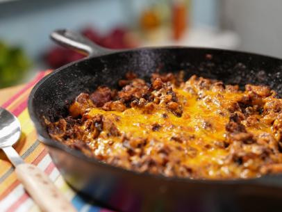 Alex Guarnaschelli makes her Loaded Home Fries, as seen on The Kitchen, season 29.