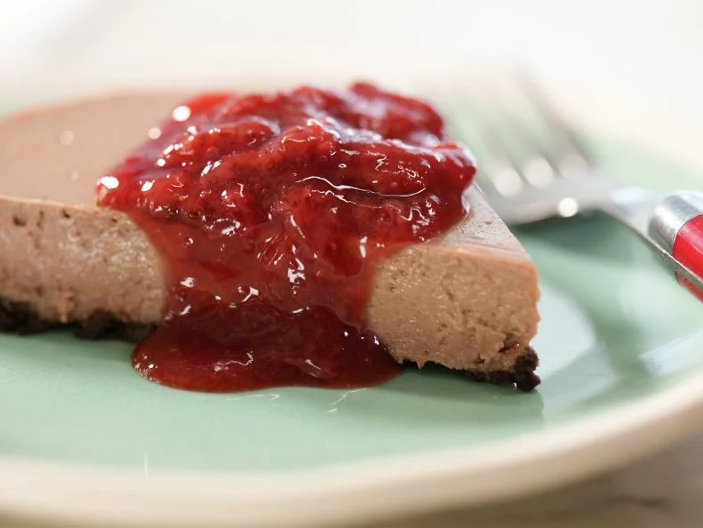Katie Lee Biegel makes her Chocolate Cheesecake with A Strawberry Topping, as seen on The Kitchen, season 29.
