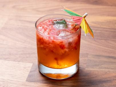 The Main Dish drink from the Blue Team Demo, featuring the mezcal club soda with strawberry and basil, as seen on Worst Cooks In America, Season 24.