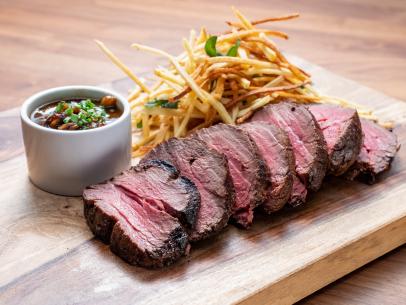 The Main Dish from the Red Team Demo, featuring roast beef tenderloin with mushroom Bordelaise and a side of French fries, as seen on Worst Cooks In America, Season 24.