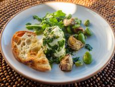 The flavors of spring bring this delicious combination to life. It's a little labor intensive with the trimming of the artichokes and processing of the favas, but well worth it.