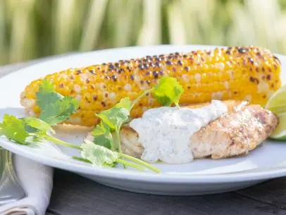 Brown Butter Striped Bass with Lime and Cilantro Aioli and Baltimore Style Grilled Corn, as seen on Food Network's Symon's Dinners Cooking Out, Season 3.