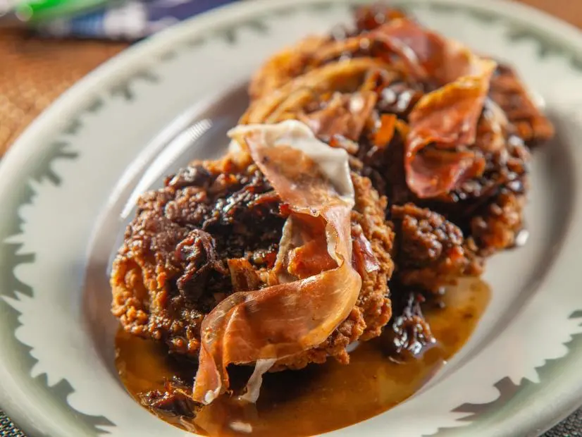 Christian Petroni’s Chicken-Fried Eggplant with Creamy Red-Eye Gravy, as seen on Guy's Ranch Kitchen Season 5.